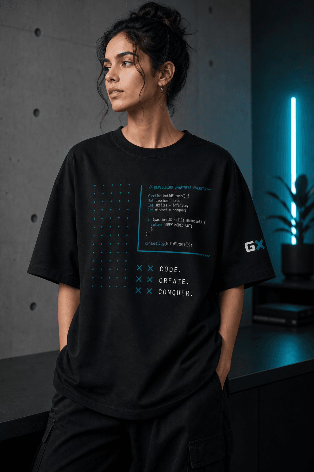Female model wearing a GeekX oversized black tee with code-inspired graphics